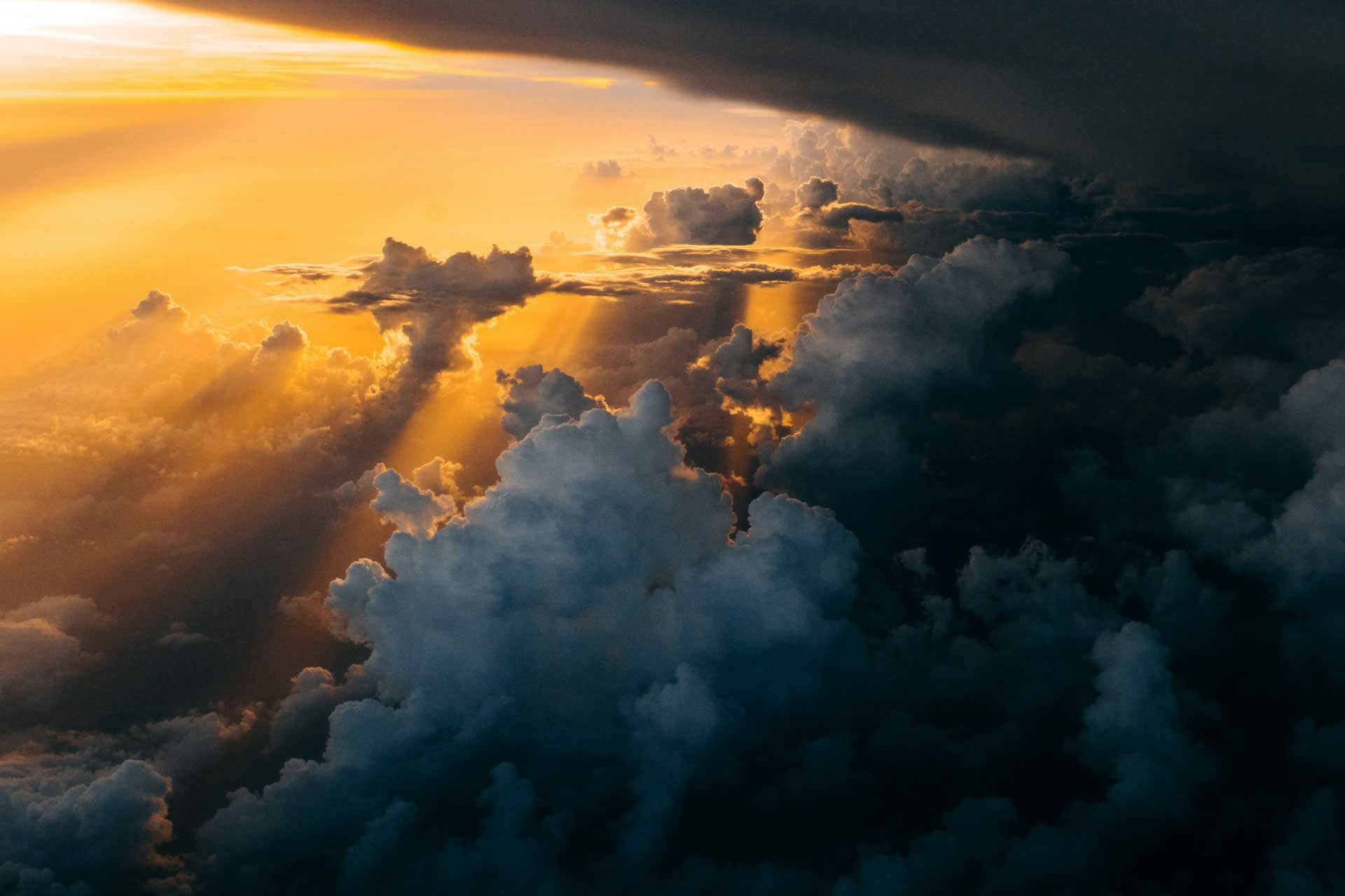 Storm clouds over a UK landscape, representing property damage affecting claimants